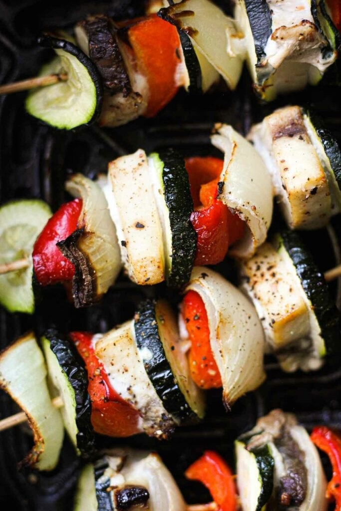 Swordfish skewers with pepper, zucchini, and onion.